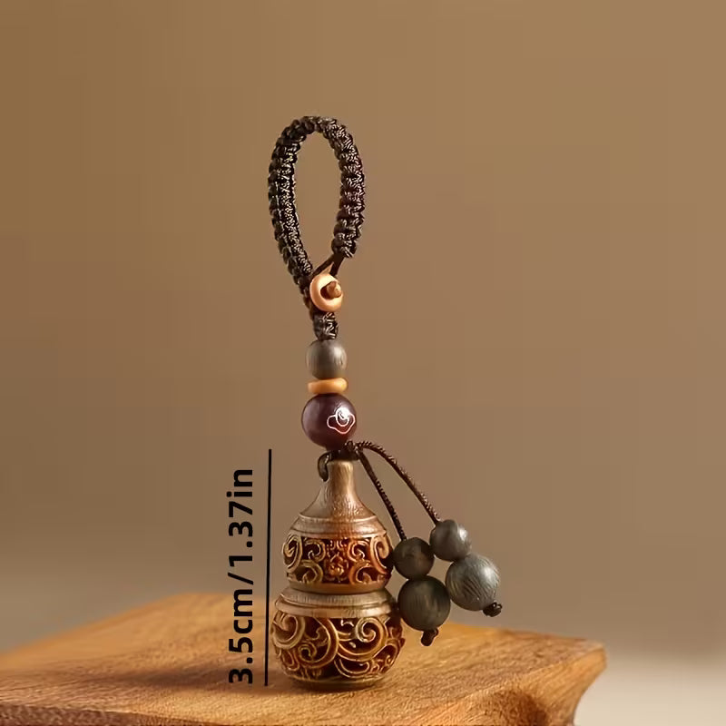 Chaveiro com pérolas perfumadas